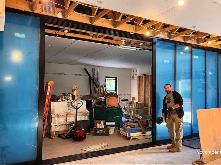 Multi-slide panels gathered to create an open passage