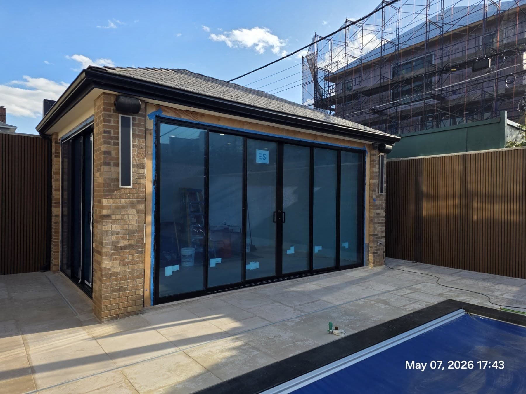 Large dark glazed doors on a residence featured by Panorama Art