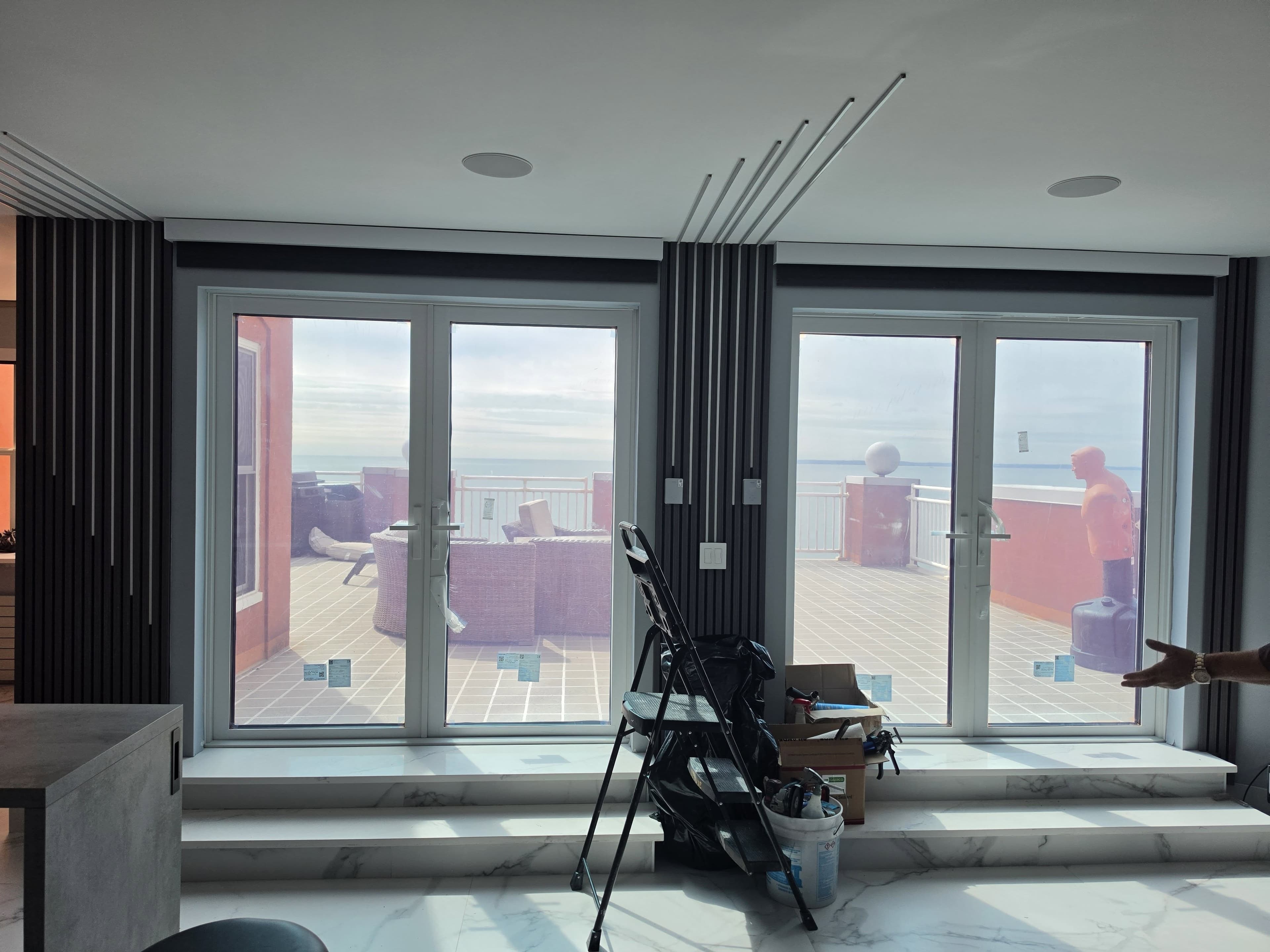 Interior installation setting with large glazed openings from Panorama Art's Instagram