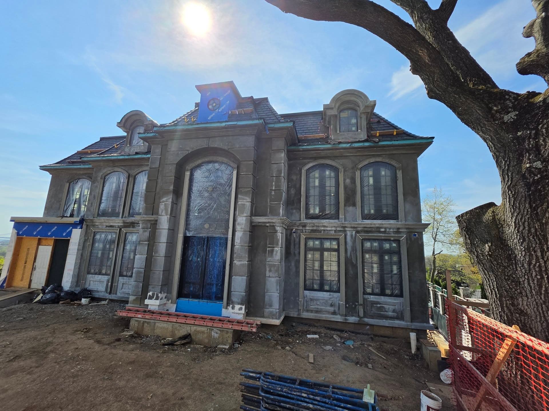 Front elevation of the classical residence during construction