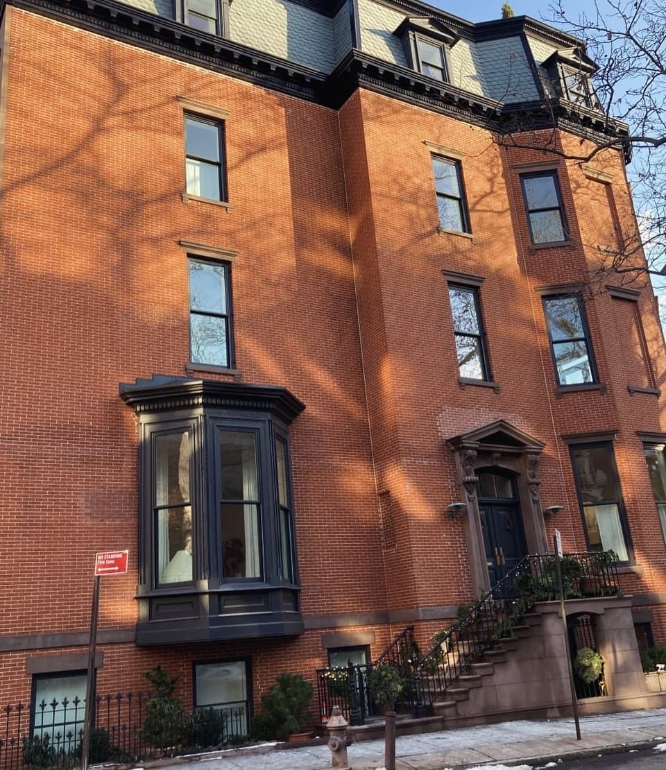 Brick side elevation with a projecting glazed bay
