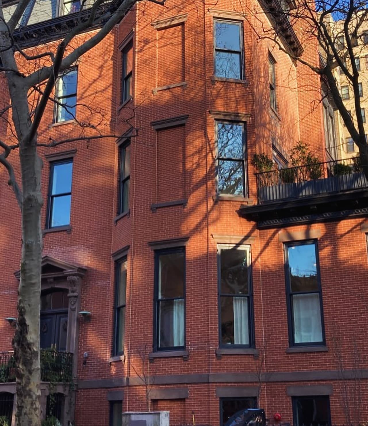 Closer view of the windows in the brick side wall