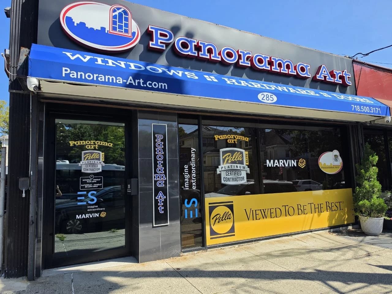 Panorama Art storefront with its blue awning and glazed entrance on New Dorp Lane